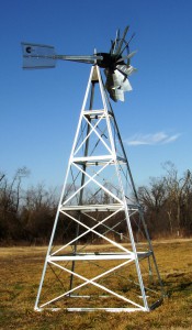 4 Legged Aeration Windmill. Metal windmill in field.